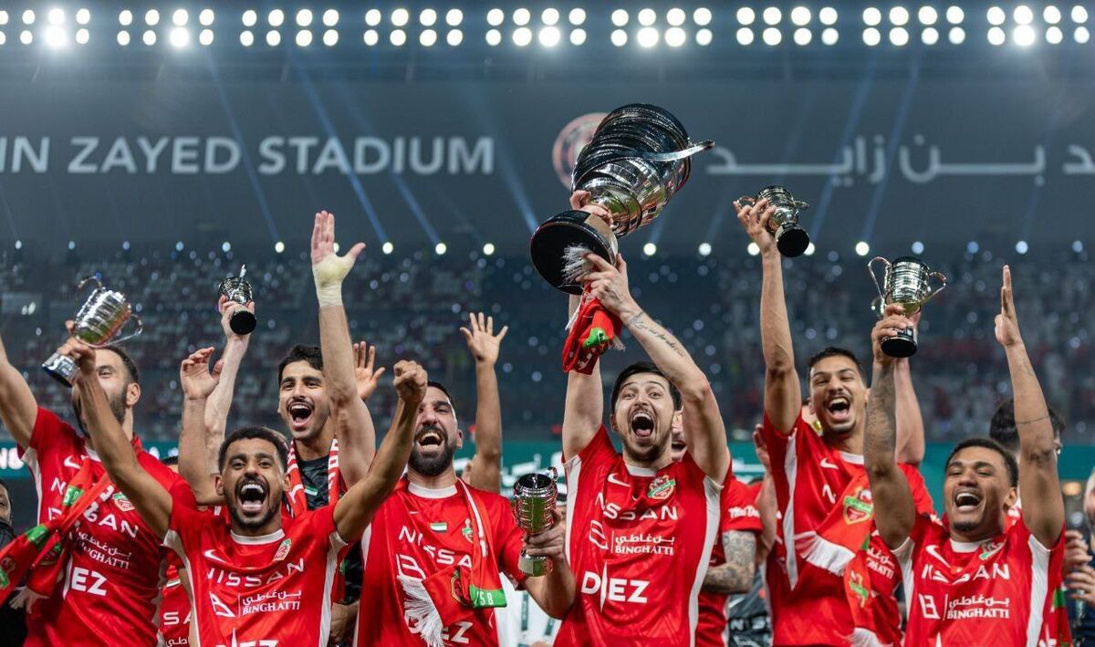 سردار-و-سعید-جام-ریاست-جمهوری-را-بالای-سر-بردند-/-عکس